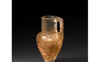 A KUFIC INSCRIBED ROCK CRYSTAL EWER IN THE STYLE OF FATIMID ...