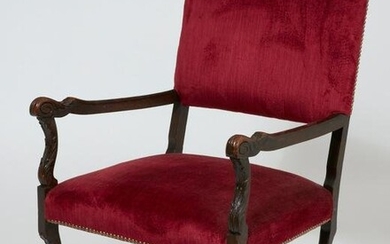 A Louis XIII style oak armchair