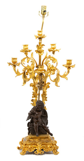 A Louis XV Style Gilt &amp; Patinated Bronze Six-Light Candelabrum