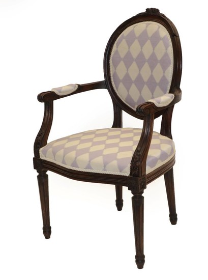 A Louis XVI Walnut Fauteuil, late 19th century, recovered in...