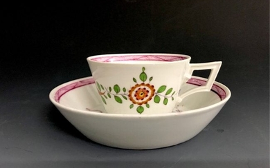 A MEISSE MARCOLINI CUP AND SAUCER