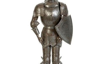 A Miniature Suit of Medieval Armor Height overall 20