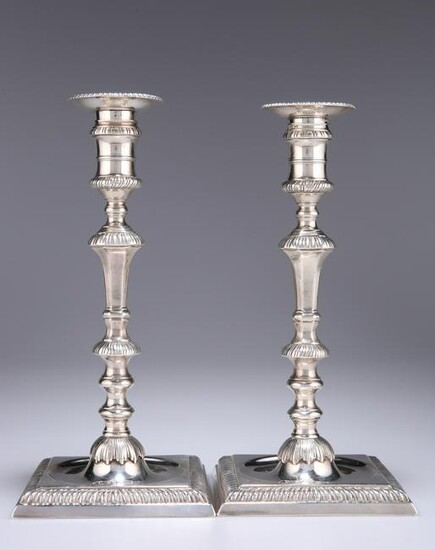 A PAIR OF GEORGE II SILVER CANDLESTICKS, probably by