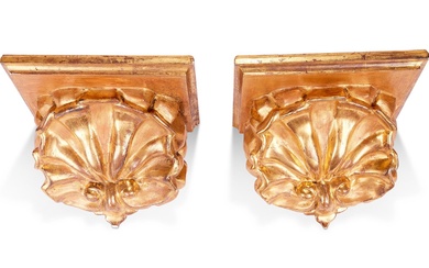 A PAIR OF GILTWOOD AND COMPOSITION SHELL CORBELS IN 18TH CENTURY STYLE