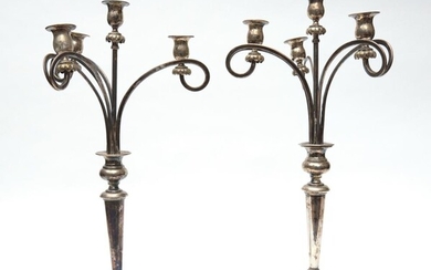 A PAIR OF SILVER PLATE FOUR SCONCE CANDELABRA (ONE A/F)