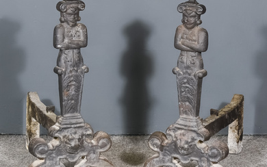 A Pair of Cast Iron Andirons, with figurative fronts on...