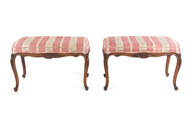 A Pair of Louis XV Style Walnut Banquettes