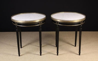 A Pair of Round Late 19th Century Black Louis XVI Style Tables. The grey veined white marble top wit