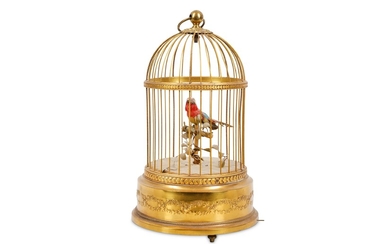 A SMALL EARLY 20TH CENTURY FRENCH GILT METAL SINGING BIRD IN CAGE AUTOMATON