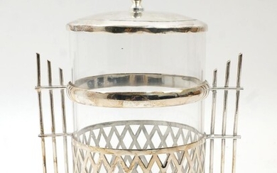 A Secessionist silver plate and glass biscuit barrel, early 20th Century, the lidded cylindrical glass body, mounted with lattice work design, flanked by geometric rod handles on ball feet, 21cm high