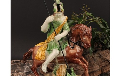 A Staffordshire pearlware figure group, of George and the Dr...