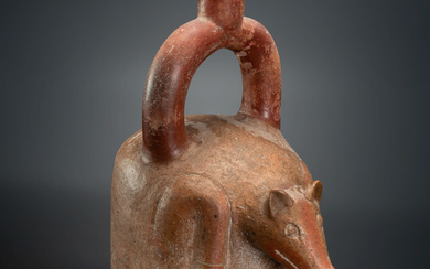 A Stirrup-Spout Bottle with a Sitting Fox, Cupisnique, Peru, 1200-200 BCE