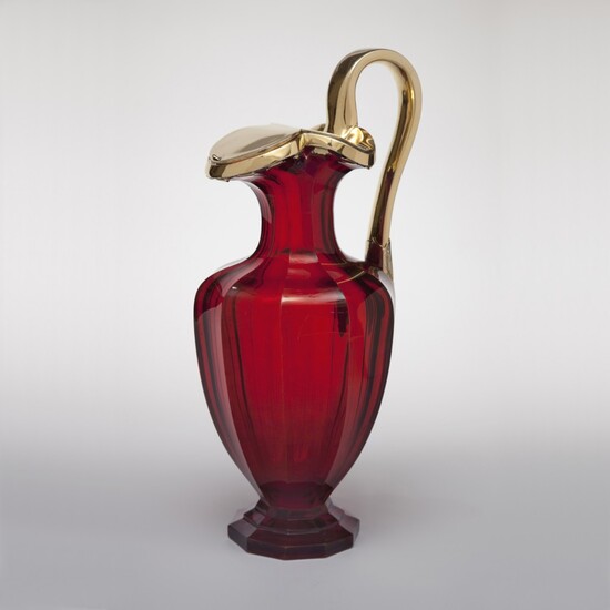A VICTORIAN SILVER-GILT MOUNTED RUBY GLASS CLARET JUG | CHARLES T. & GEORGE FOX, LONDON | 1858