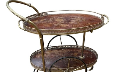 A VINTAGE BRASS AND MAHOGANY TWO TIER TRAY TOP DRINKS TROLLE...