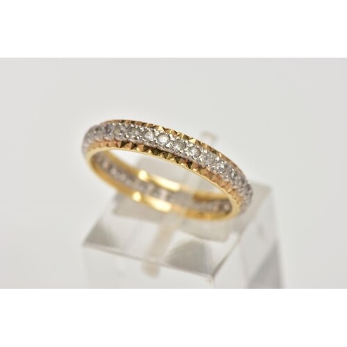 A YELLOW METAL FULL ETERNITY RING, set with colourless spine...