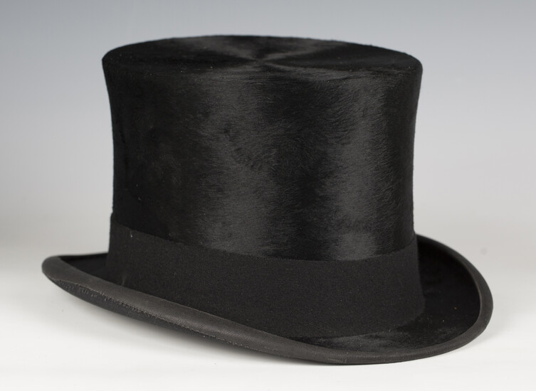 A black silk top hat by Lock & Co, London, head circumference 58cm, together with its card box.