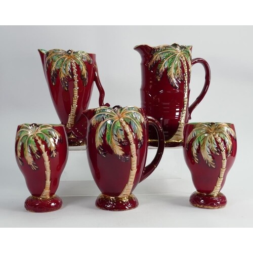 A collection of Beswick Red Palm vases and Jugs: tallest 21c...