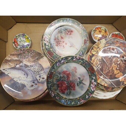 A collection of Bradex & similar cabinet plates with floral ...