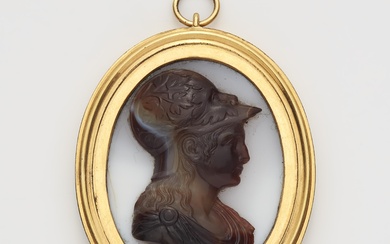 A copper gilt white and banded agate cameo pendant.