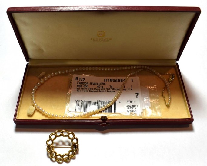 A cultured pearl necklace in Mikimoto box, length 48cm; and...