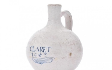 A dated London delft wine bottle, 1642