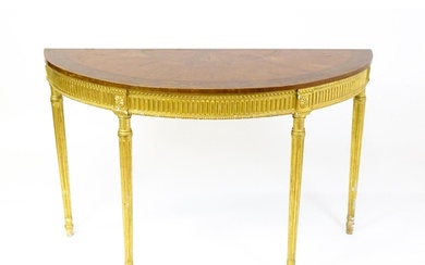 A demi lune console table with a marquetry inlaid top above ...