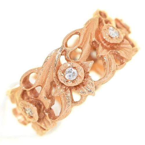 A diamond daffodil openwork band ring, in Welsh 14ct gold, ...