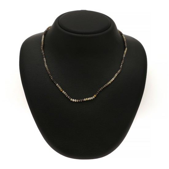 A diamond necklace set with numerous roundel-cut diamonds with a 14k gold clasp. L. app. 47.5 cm.