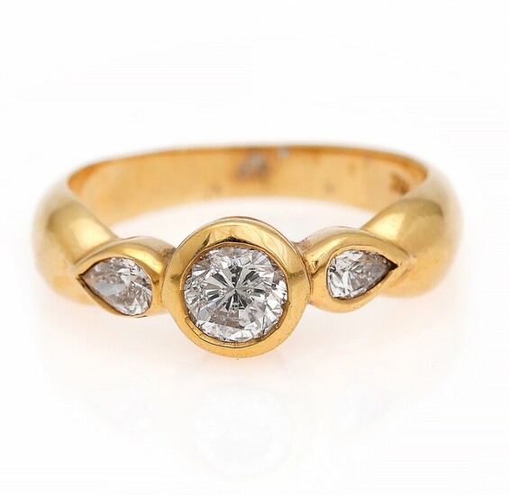 NOT SOLD. A diamond ring set with a brilliant-cut weighing app. 0.60 ct. flanked by...