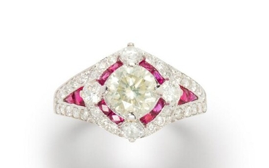 A diamond, ruby and eighteen karat white gold ring