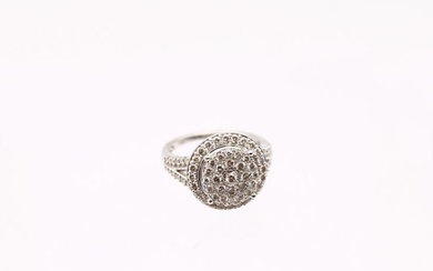 A diamond set 9ct white gold halo cluster ring, set...