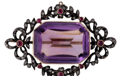 A gold, amethyst, ruby and diamond, brooch, centring on a rectangular mixed-cut buff top amethyst within a garland frame of rose-cut diamonds, accented with circular-cut rubies, mounted in silver and gold, French assay marks and numbered 5690, c...