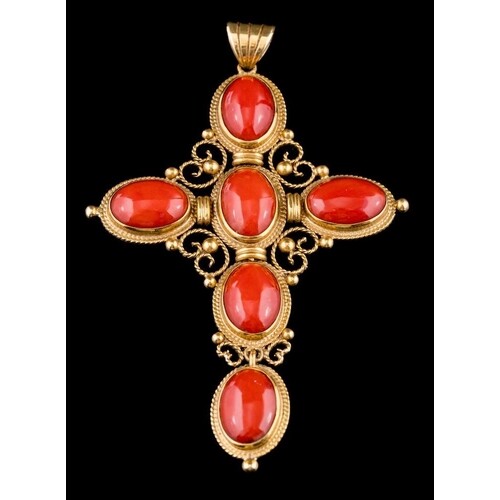 A gold coloured coral cross pendant,: set with oval cabochon...