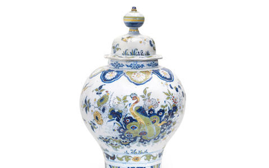 A large Dutch Delft baluster vase and cover, De Paauw factory, circa 1700