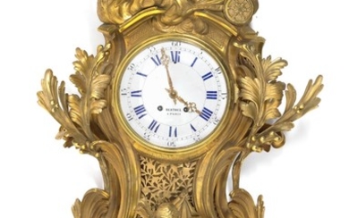 A large French Louis XV style gilt bronze cartel clock. Signed 'Bertoul a Paris'. C. 1870. H. 98 cm. W. 60 cm.