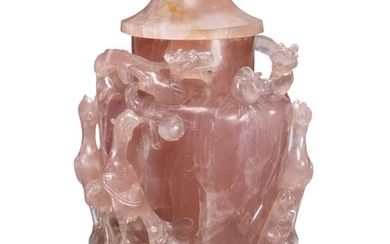 A large carved rose quartz vase with cover. Late Qing. H. 27 cm. Wooden base included. (2)