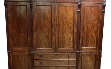 A large good quality 19th century mahogany breakfront wardrobe, with...
