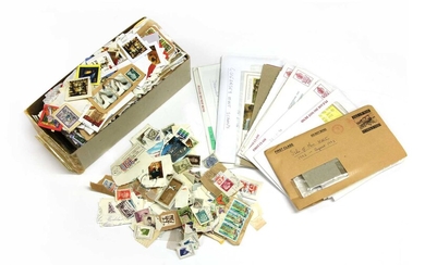 A large quantity of all world stamps in packets and loose
