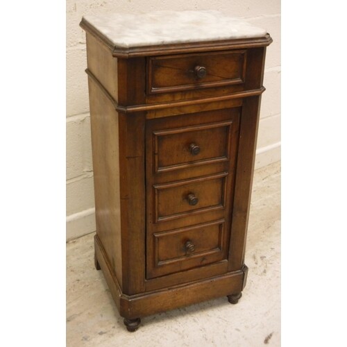 A late 19th Century French walnut marble top pot cupboard wi...