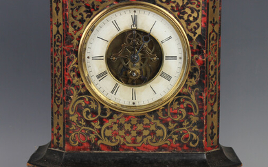 A late 19th century French ebonized and red tortoiseshell boulle cased mantel timepiece, the white c