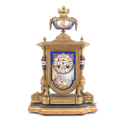 A late 19th century French gilt spelter and Sevres style porcelain mounted mantel clock