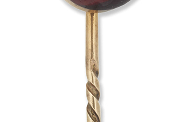 A late Victorian gold and garnet fox stick pin, the...