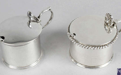 A late Victorian silver drum mustard pot & an early Edwardian example. (2).