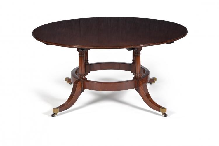 A mahogany circular concentric extending dining table, in 19th century style, second half 20th century
