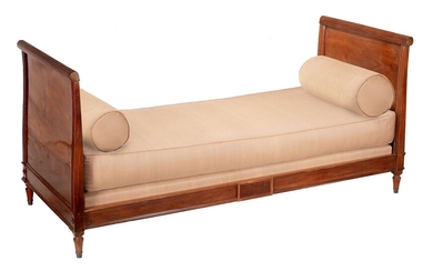 A mahogany day bed in Regency style