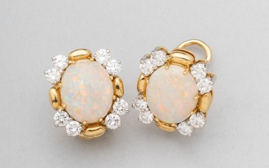 A pair of Cavelti 18kt yellow gold and platinum, opal, and diamond stud earrings