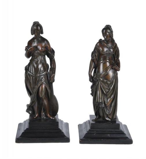 A pair of Continental, probably French gilt bronze mounts cast as maidens