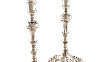A pair of George III cast silver candlesticks