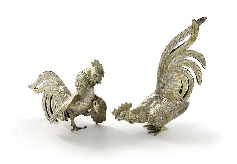 A pair of modern silver fighting cocks