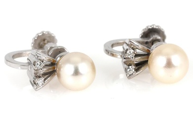 A pair of pearl and diamond ear screws each set with a...